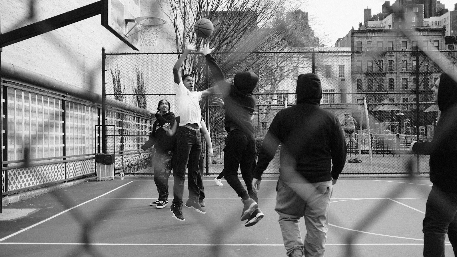 Street basketball game in moody black and white — the culture behind the most expensive NBA jersey ever sold