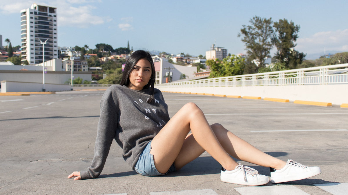 How to match sneakers with outfits — street style look with sneakers on an urban road