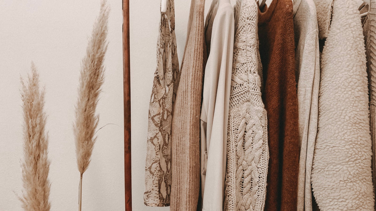 Minimal clothing rack with fall wardrobe essentials — fall streetwear essentials 2026